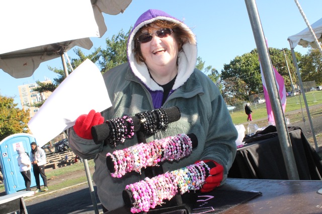 Vendor selling bracelets at charity event